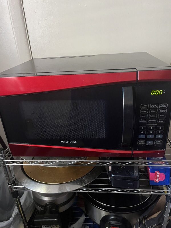 small microwave oven countertop. West Bend. 900 Watts. Works Perfectly.