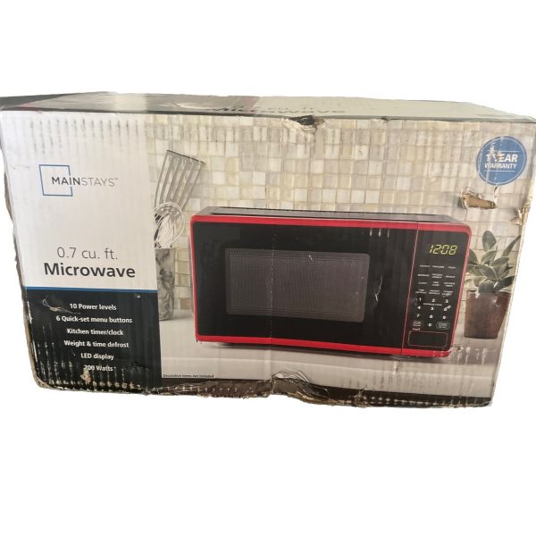 Mainstays 0.7 Cu ft Countertop Microwave Oven, 700 Watts, Red