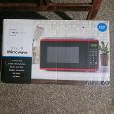 Mainstays 0.7 Cu ft Countertop Microwave Oven, 700 Watts, Red